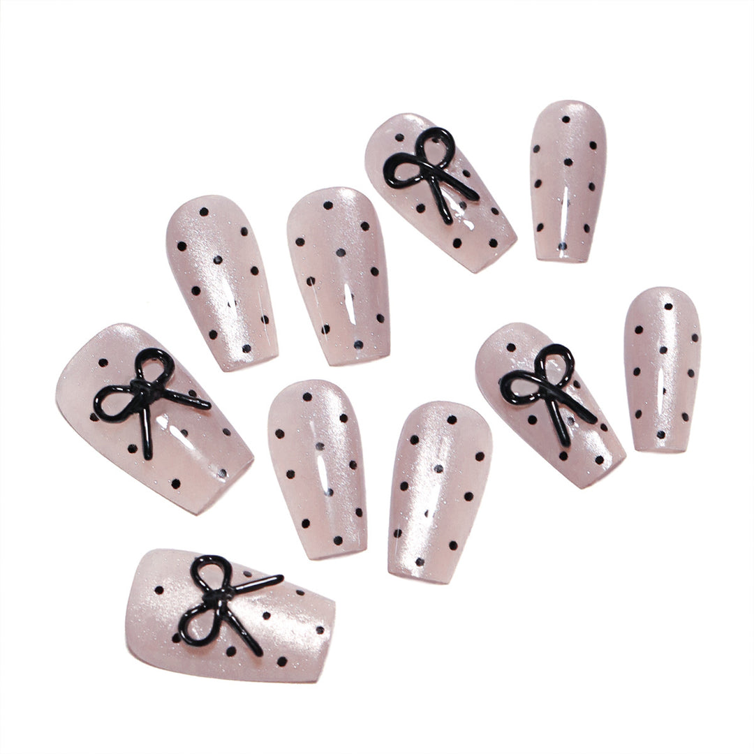 Artful Nail Extensions with Bow Pattern Stornfield