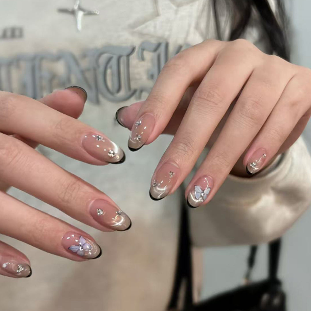 Artificial nail art with pearl and flower decorations Stornfield