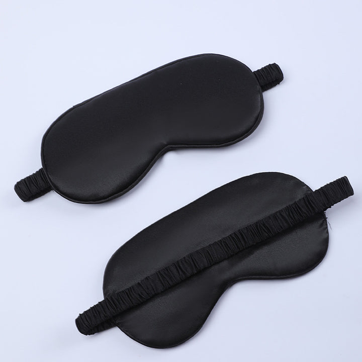 Women's nano silk sleep mask with padded eye area, adjustable elastic band, and storage pouch Stornfield