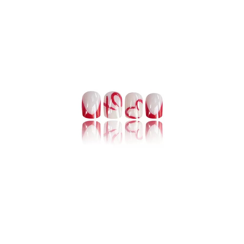 Artificial nail set with romantic heart design and stylish accents Stornfield