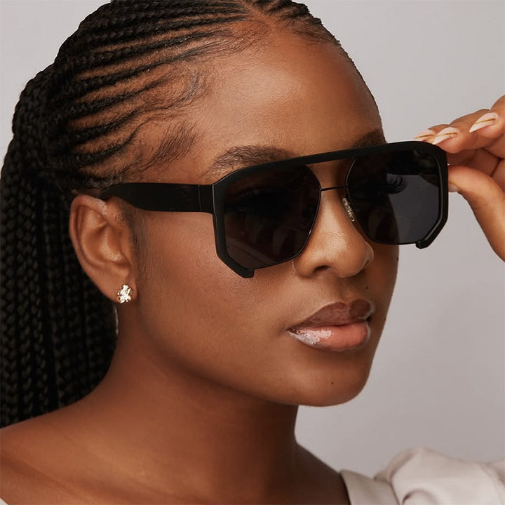 Ladies fashionable oversized sunglasses with elegant, faceted frame construction Stornfield
