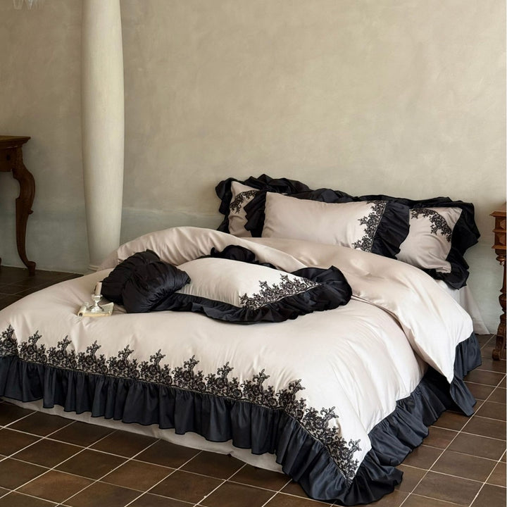Satin bedding set with contrasting ruffle and ornament embroidery