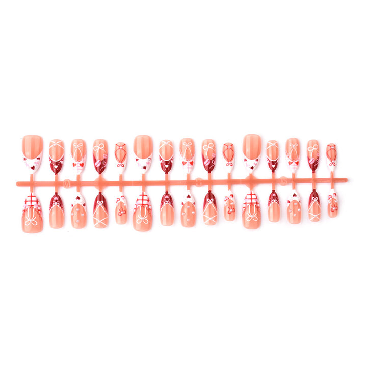 Decorative Press-On Nail Art Set with Bow and Heart Designs Stornfield