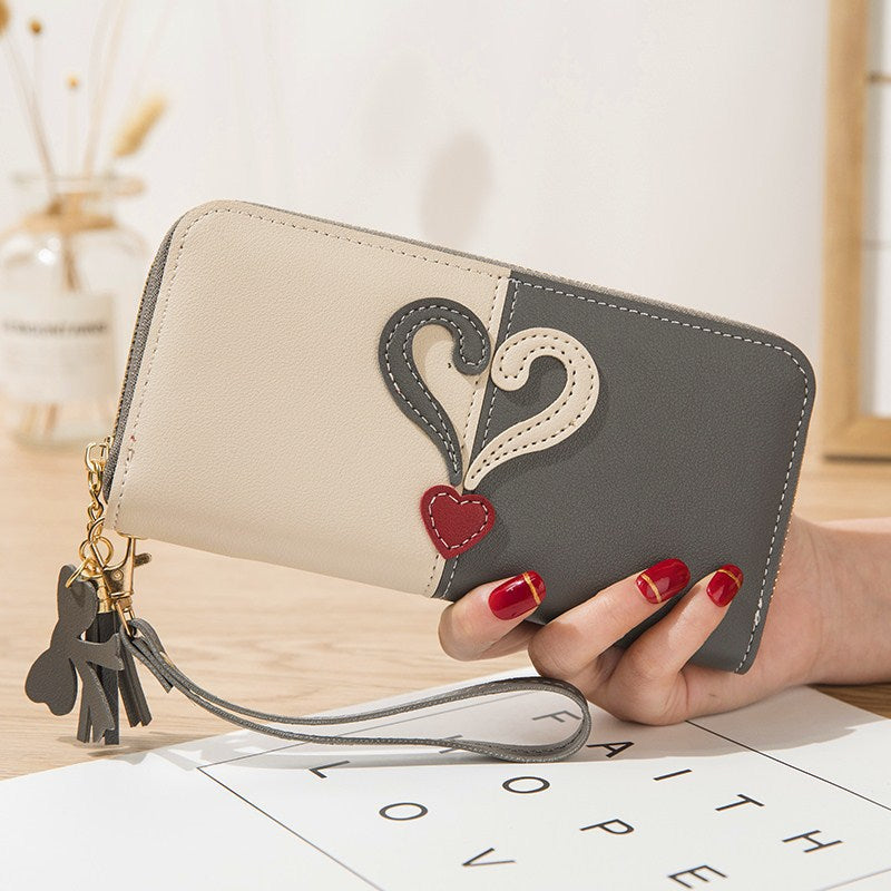 Stylish wallet with heart appliqués Stornfield