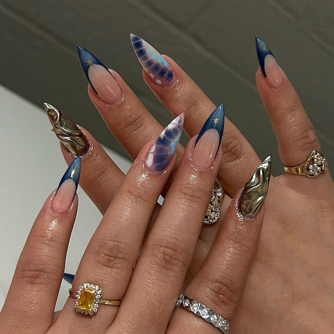 Artful stiletto nails with glitter and extraordinary design Stornfield