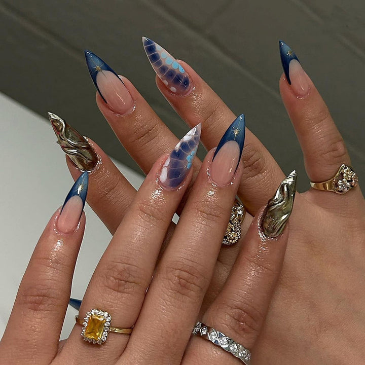 Artful stiletto nails with glitter and extraordinary design Stornfield
