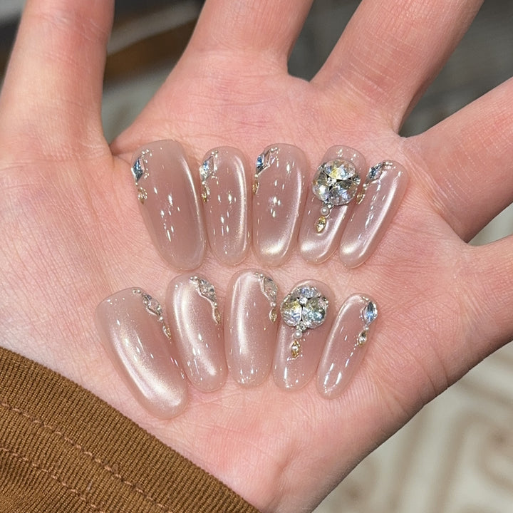 Glamorous artificial nails with rhinestone embellishments Stornfield