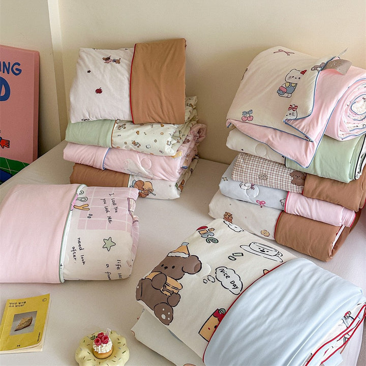 Quilted children's comforter with cute animal print and light microfiber filling