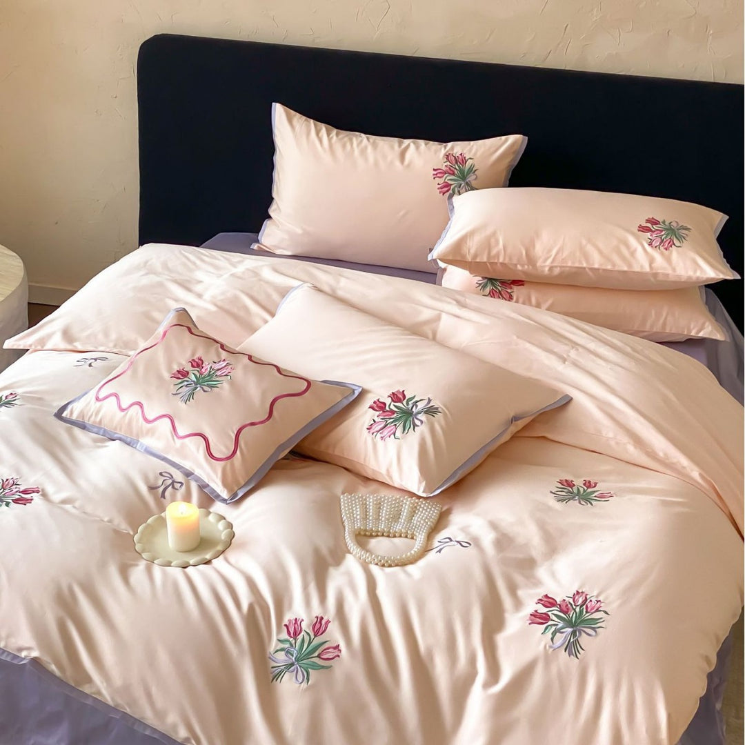 Fine cotton satin bedding set with embroidered tulip bouquets and contrasting piping