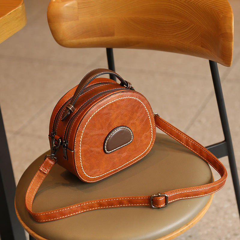 Vintage-Inspired Round Crossbody Bag