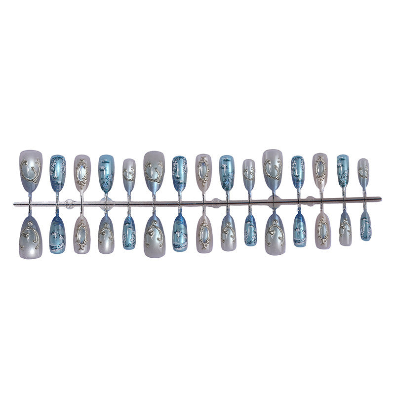 Nail art set with luxurious patterns and elegant embellishments Stornfield