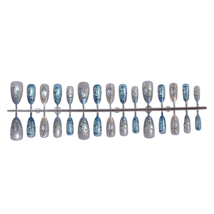 Nail art set with luxurious patterns and elegant embellishments Stornfield