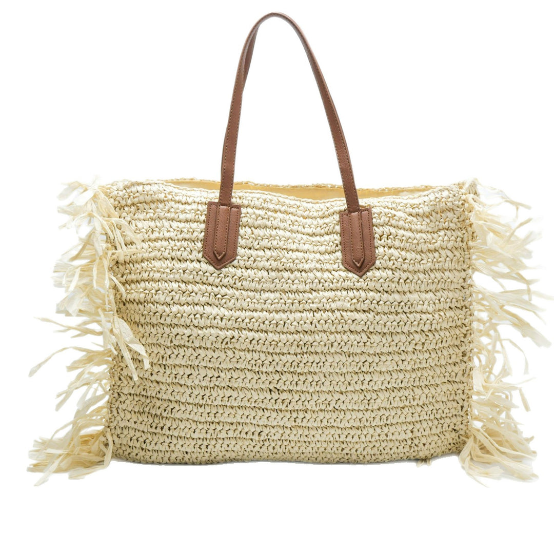Beach bag made of handwoven straw with fringes Stornfield
