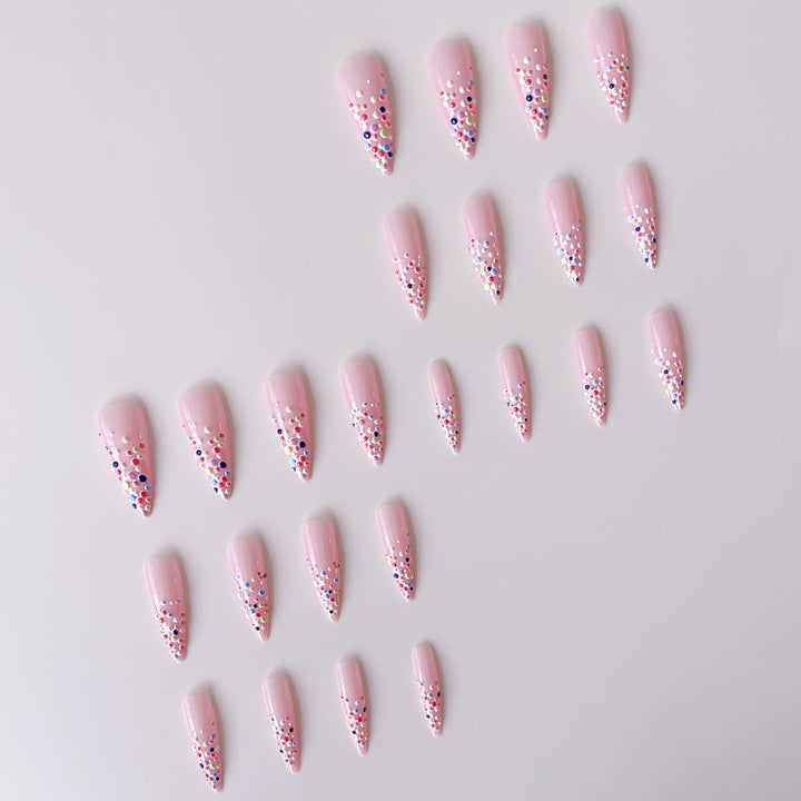 Acrylic nail set with colorful glitter dots and elegant tips Stornfield