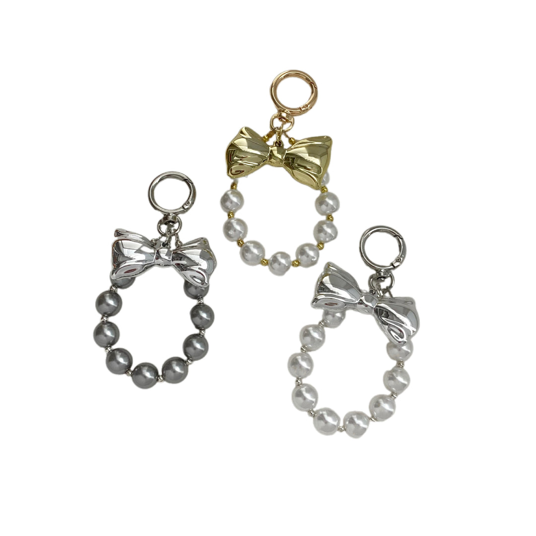 Elegant Pearl Bow Keychain Stornfield