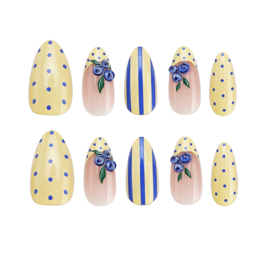 Artful stiletto nails with floral accents and colorful patterns Stornfield