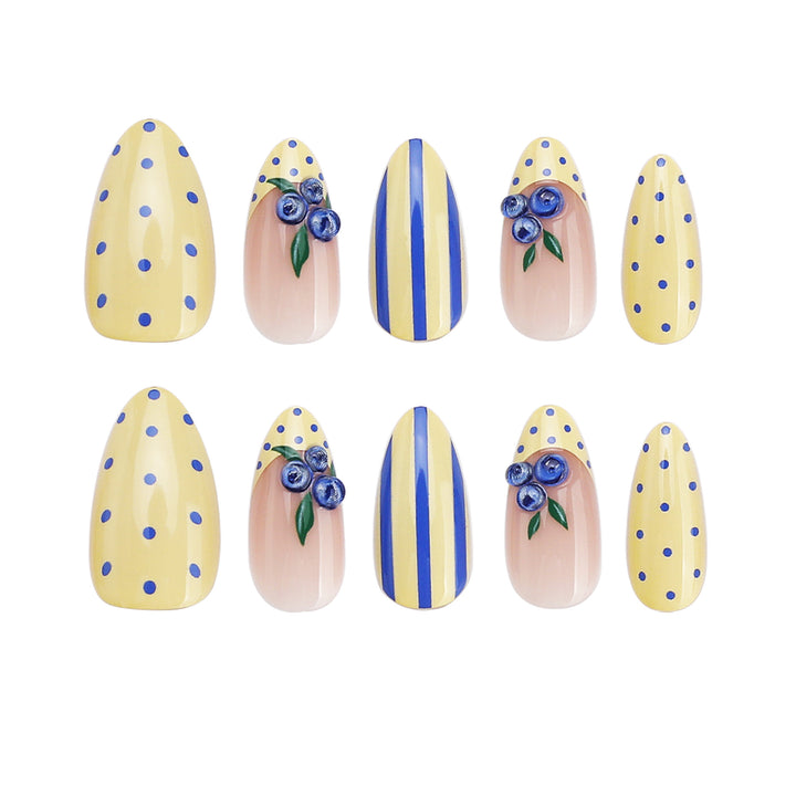 Artful stiletto nails with floral accents and colorful patterns Stornfield