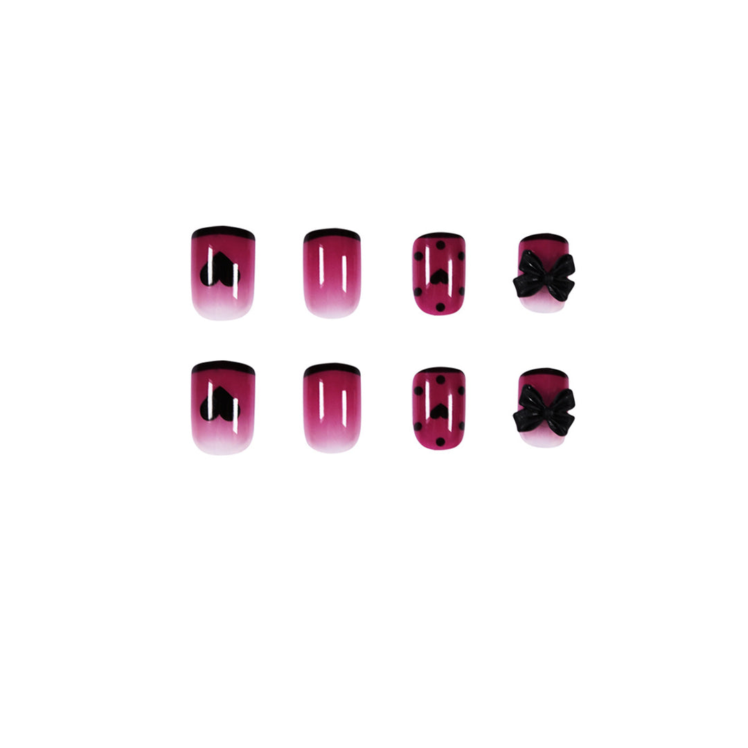 Artistic nail extensions with cute bow and heart designs Stornfield