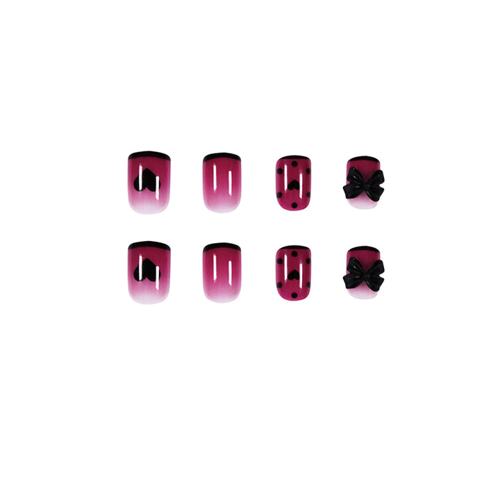 Artistic nail extensions with cute bow and heart designs Stornfield