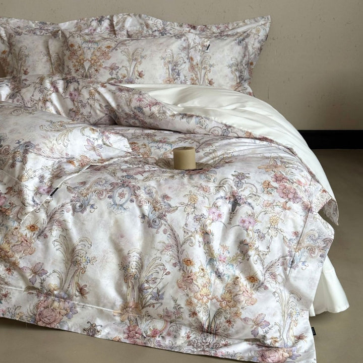 Fine cotton satin bed linen set with watercolor floral ornamentation and hotel closure