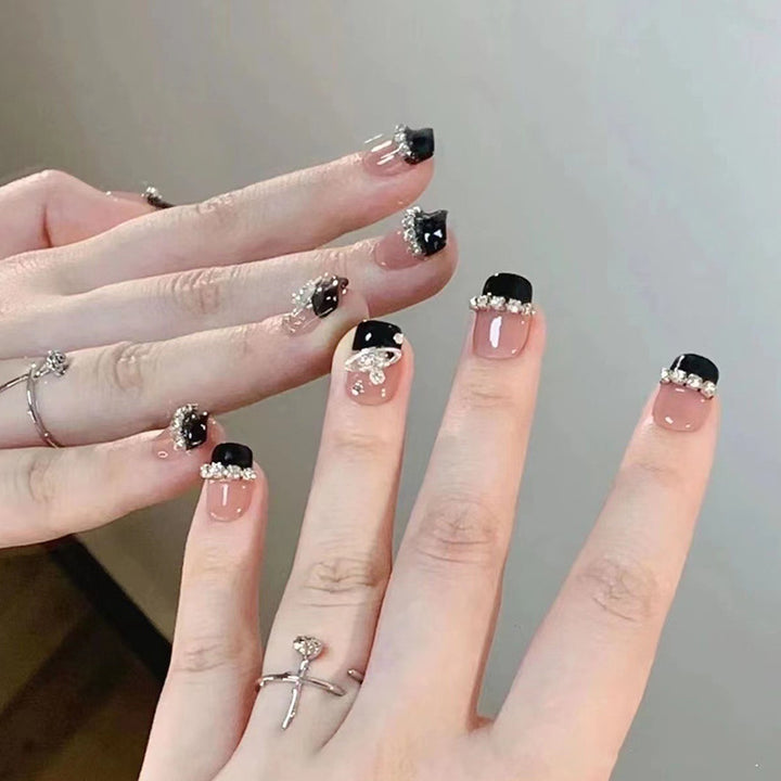 Glamorous artificial nail set with sparkling crystal embellishments Stornfield