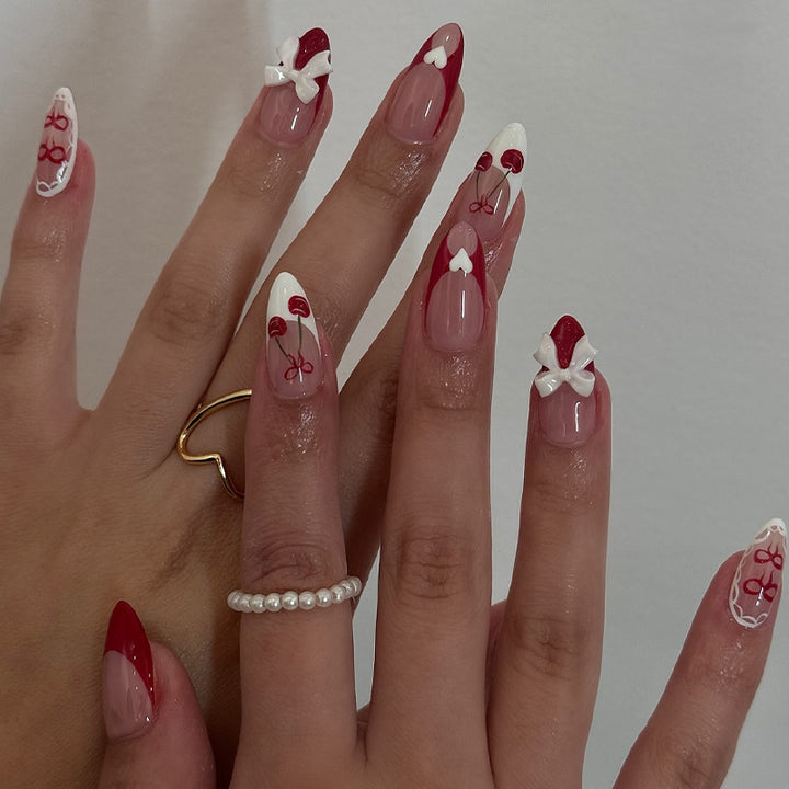 Fake nail set with playful motifs and elegant accents Stornfield