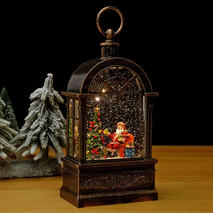 Nostalgic Christmas lantern with snowfall and moving Santa Claus scene Stornfield