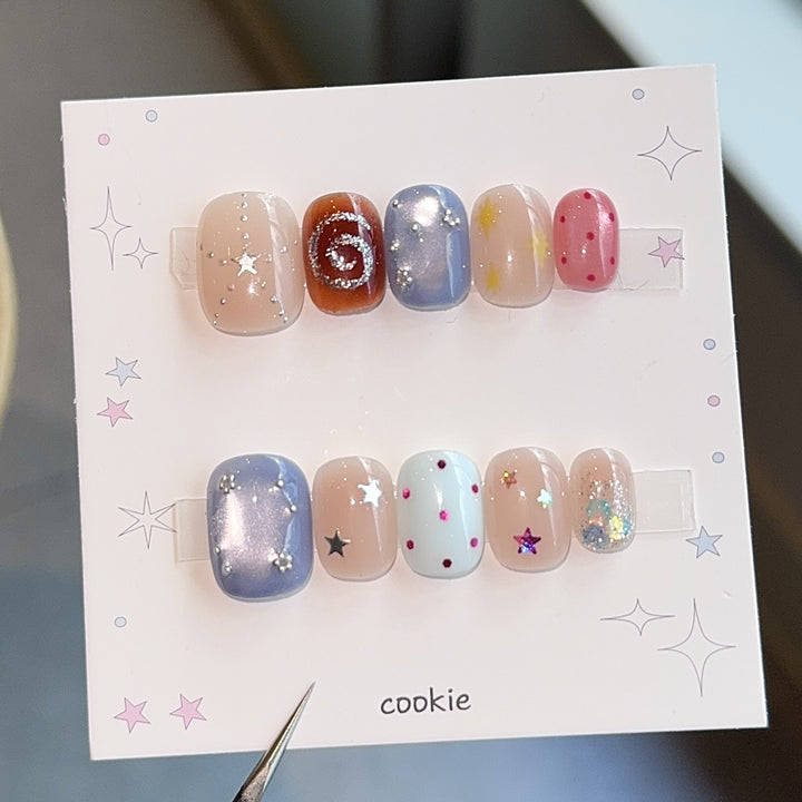 Creative artificial nails with sparkling star patterns Stornfield