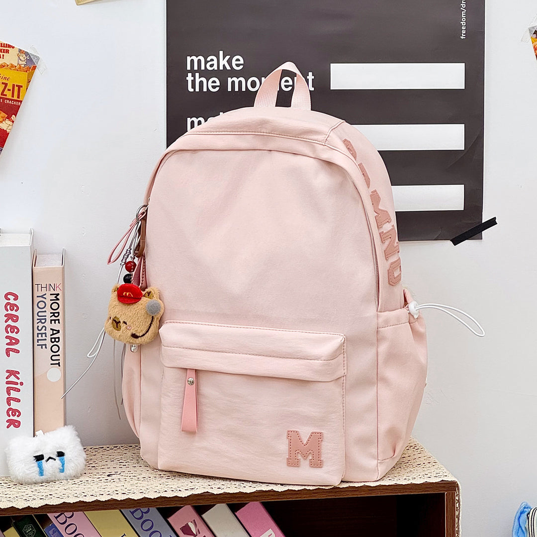 Stylish Canvas Backpack with Plush Keychain Stornfield
