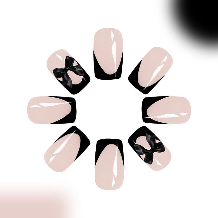Artificial nail set with glamorous bow decorations Stornfield
