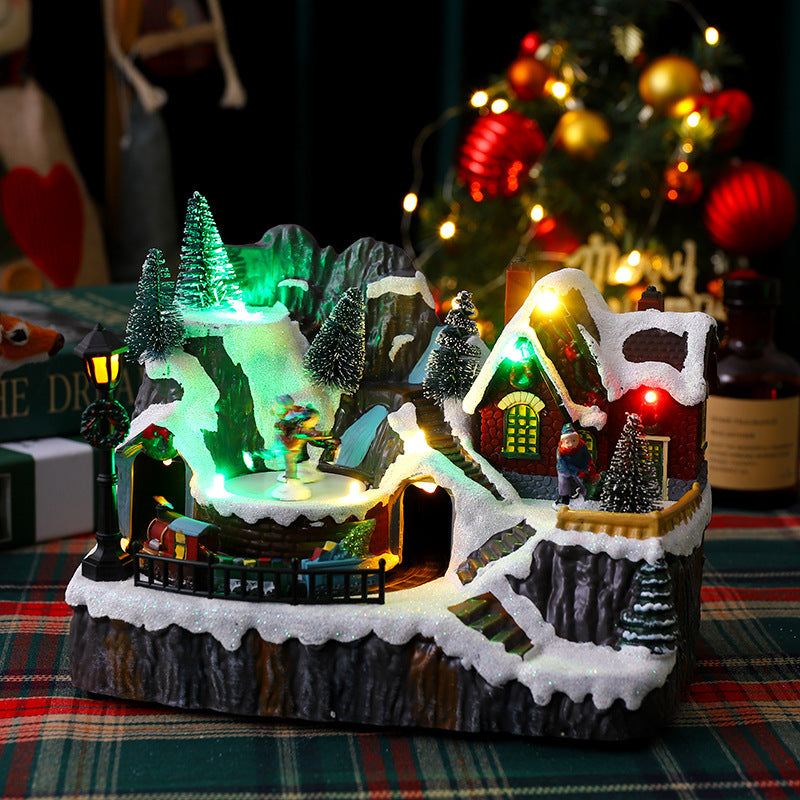 Illuminated Christmas village decoration with moving figures Stornfield