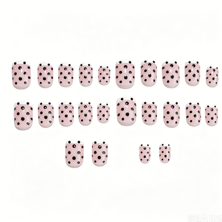 Artificial nail set with elegant dots and French tips Stornfield