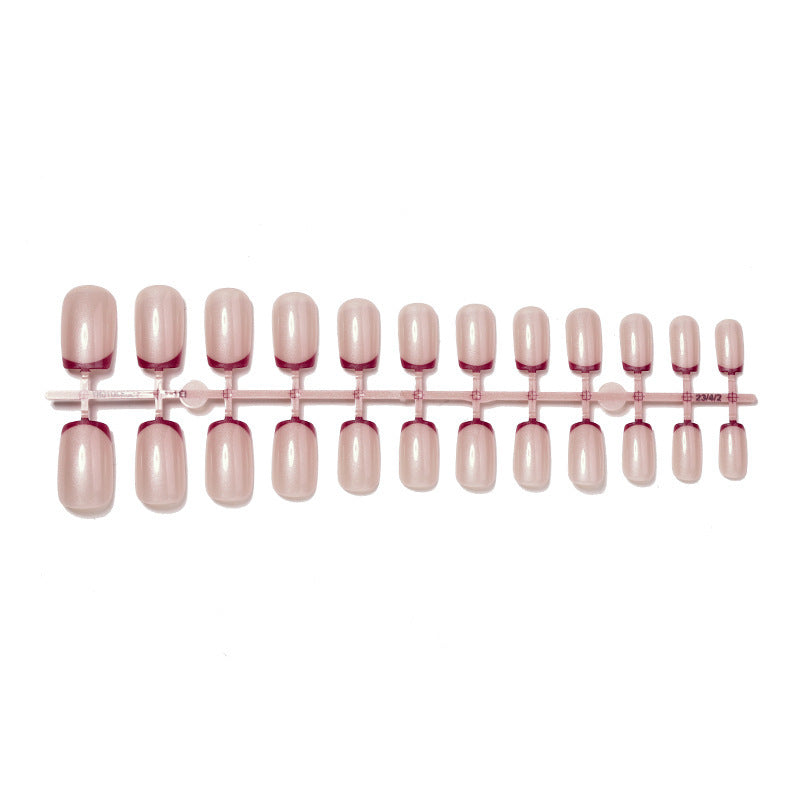 Artificial nail set with glamorous French tip design Stornfield