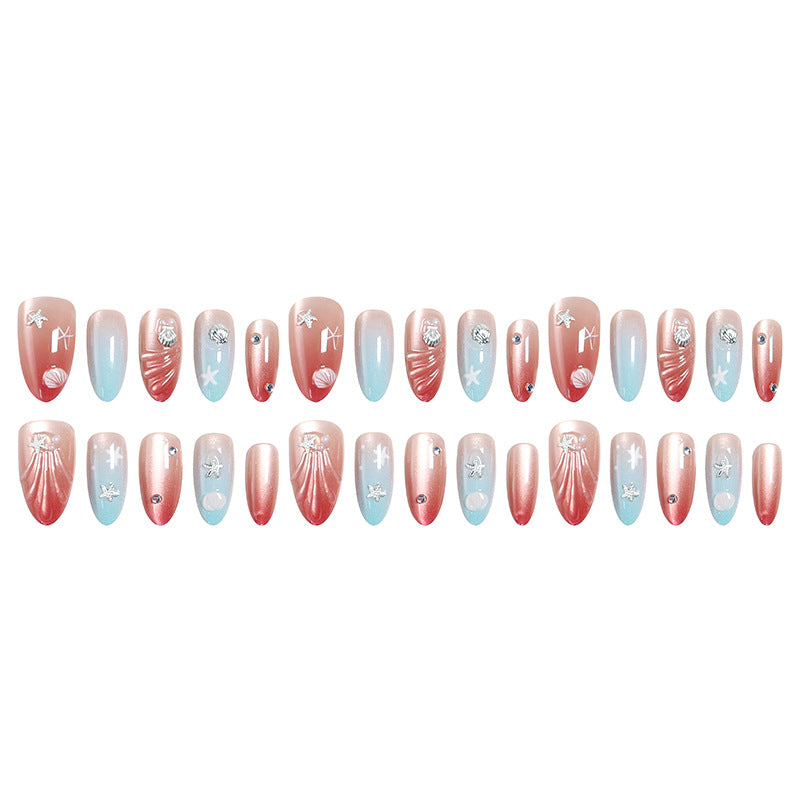 Artificial nails with sparkling rhinestone embellishments and maritime design Stornfield