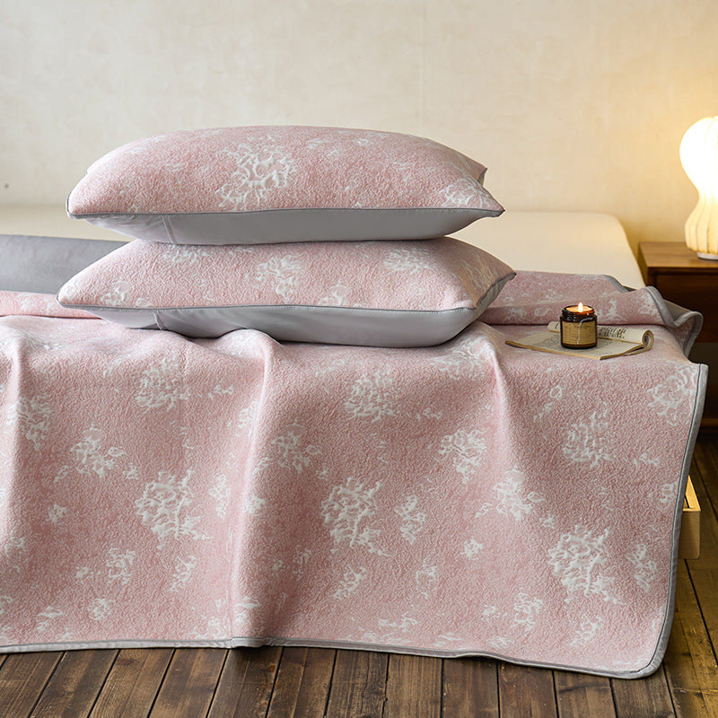 Quilted microfiber mattress pad with non-slip bottom and floral jacquard surface