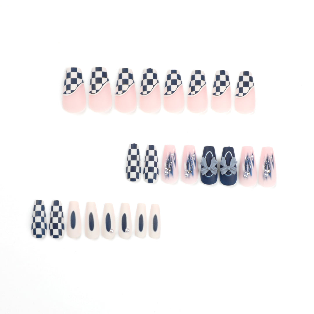 Artful nail decoration with bows and plaid pattern Stornfield