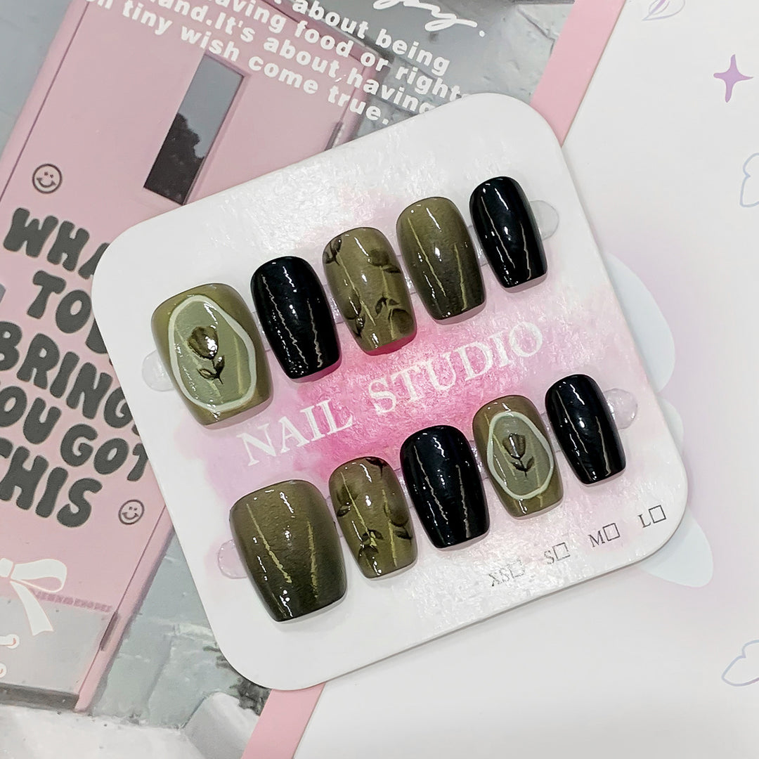 Artistic acrylic nails with floral designs Stornfield