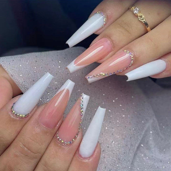 Artful nail extensions with rhinestone embellished accents Stornfield