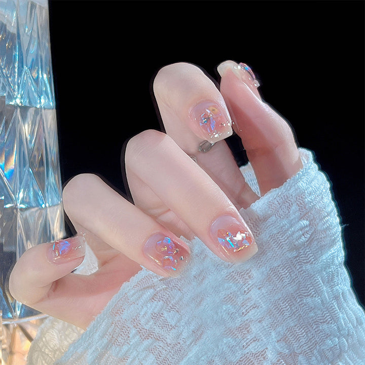 Nail set with sparkling 3D applications and romantic elements Stornfield