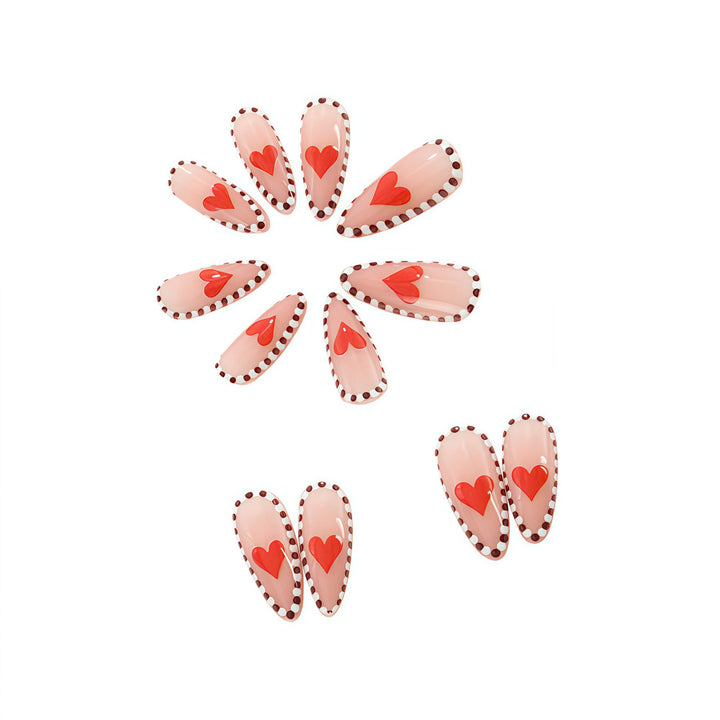 Artificial nails with heart-shaped accents Stornfield
