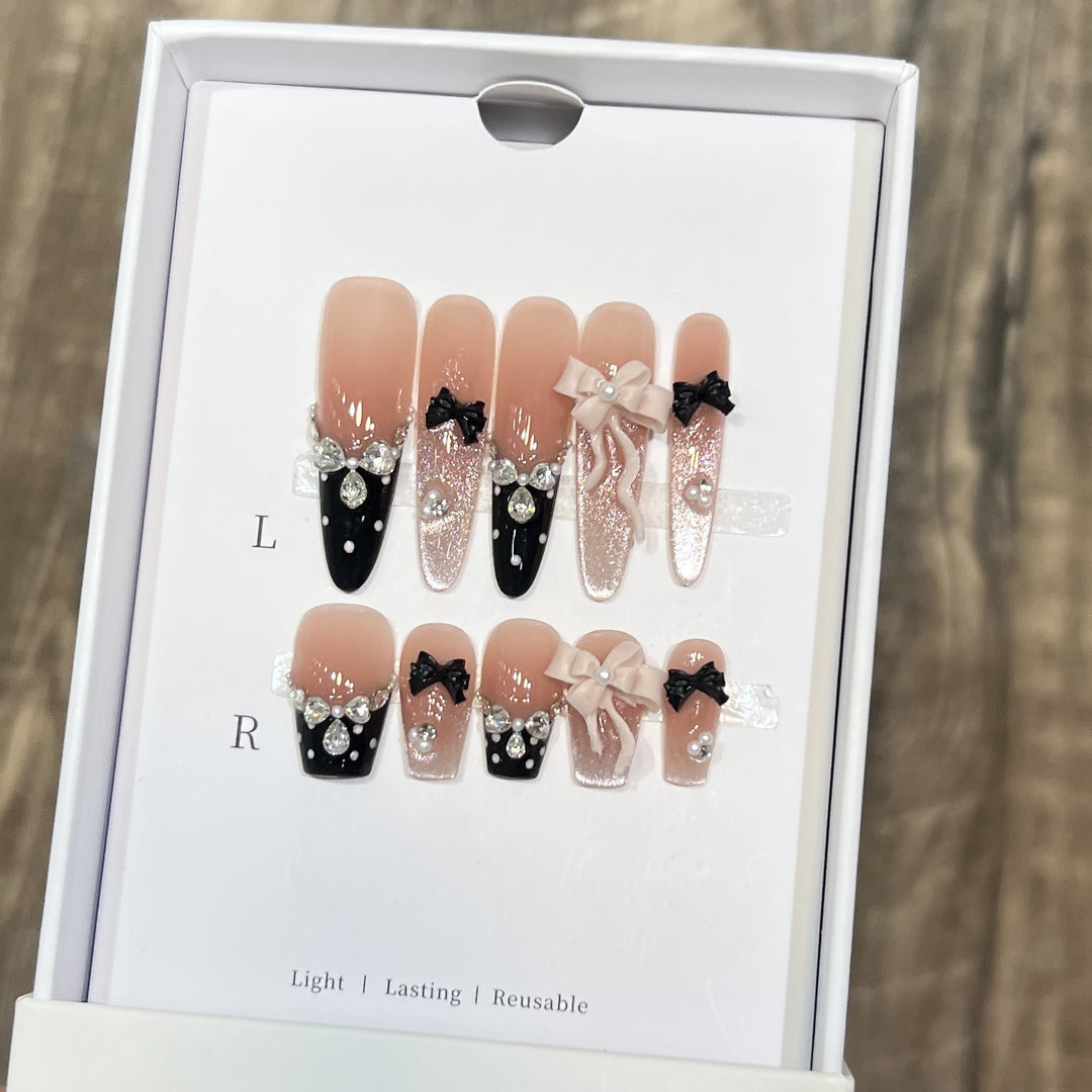 Glamorous Stiletto Press-On Nail Set with Decorative Bow and Gemstone Accents Stornfield