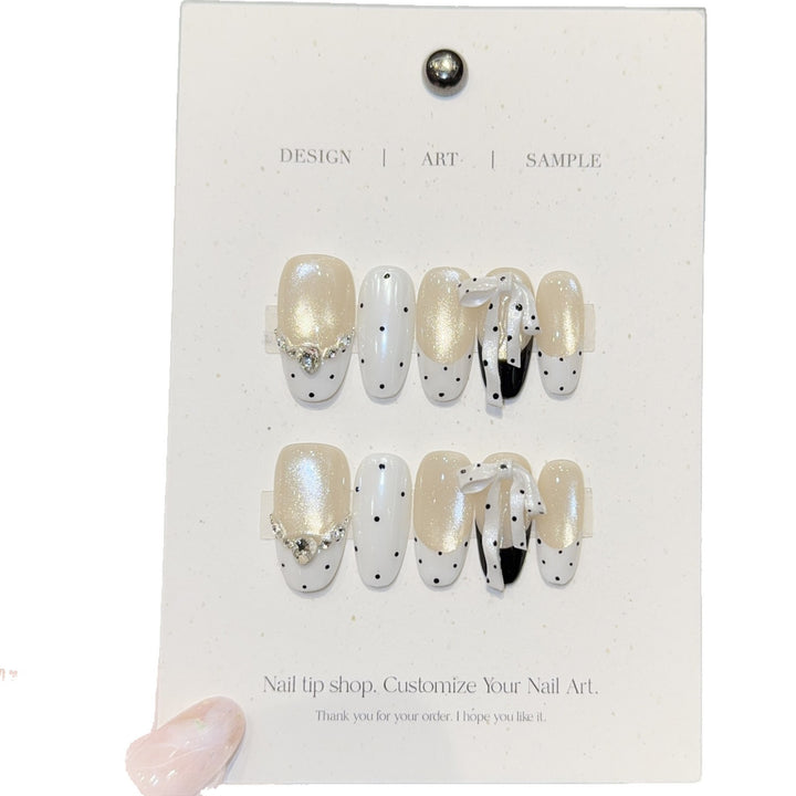 Artificial nails with glitter and bows Stornfield