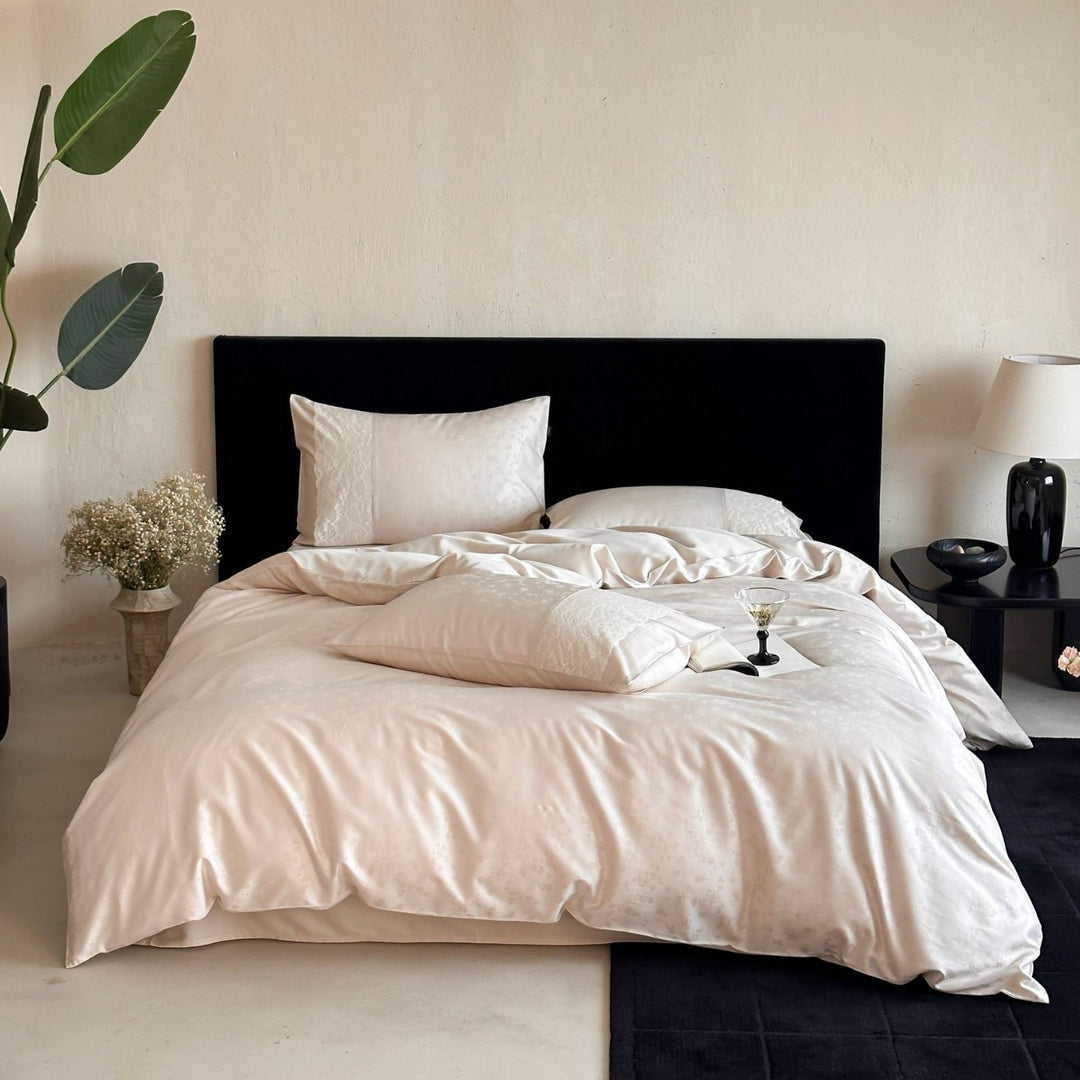 Satin bed set with subtle floral jacquard, reversible look and elegant piping seam