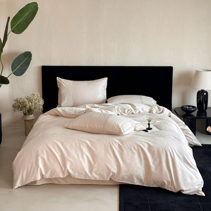 Satin bed set with subtle floral jacquard, reversible look and elegant piping seam