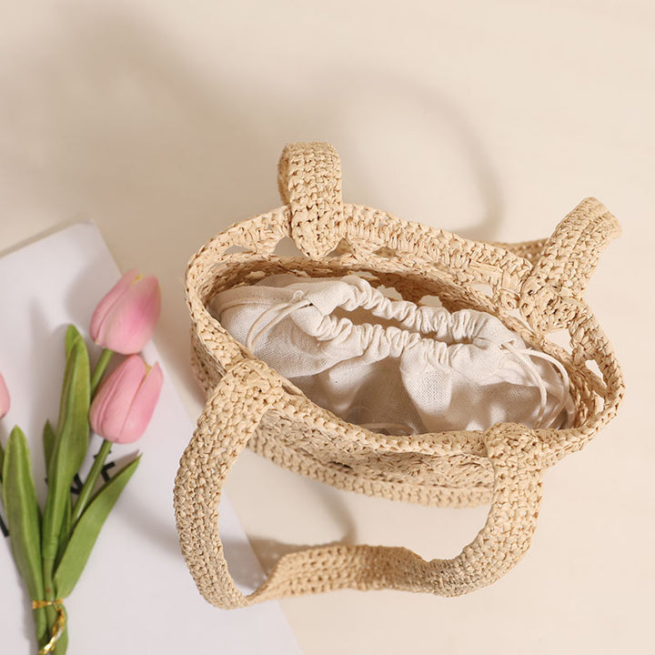 Handcrafted net straw bag with elegant straps Stornfield