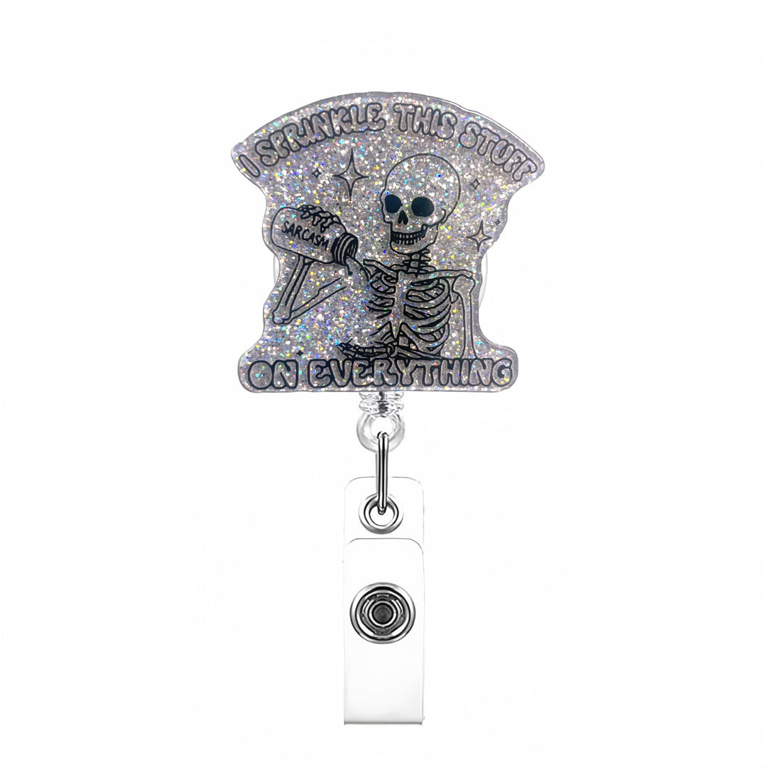 Expandable badge holder with anatomical heart pendant