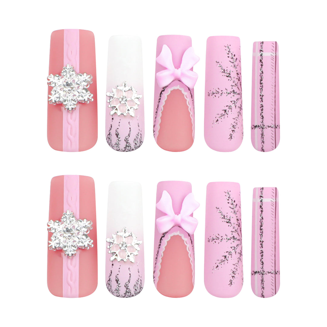 Artful nail extensions with festive decorations Stornfield