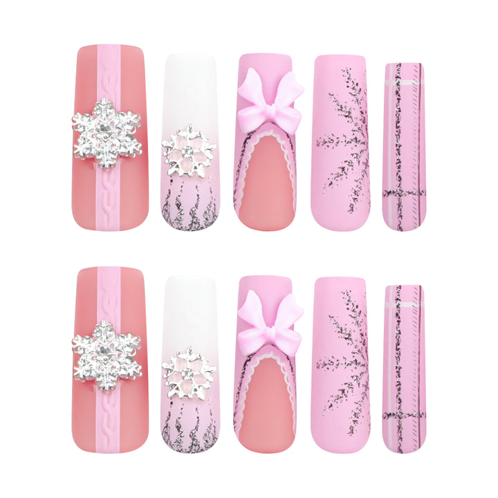 Artful nail extensions with festive decorations Stornfield