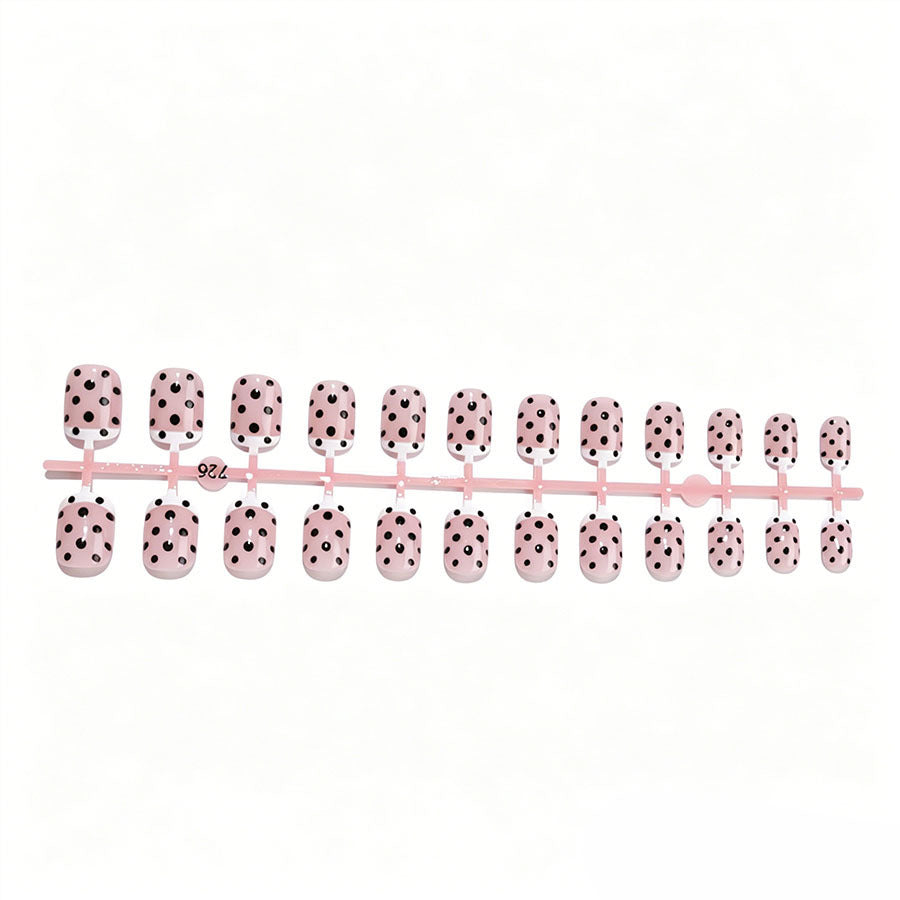 Artificial nail set with elegant dots and French tips Stornfield