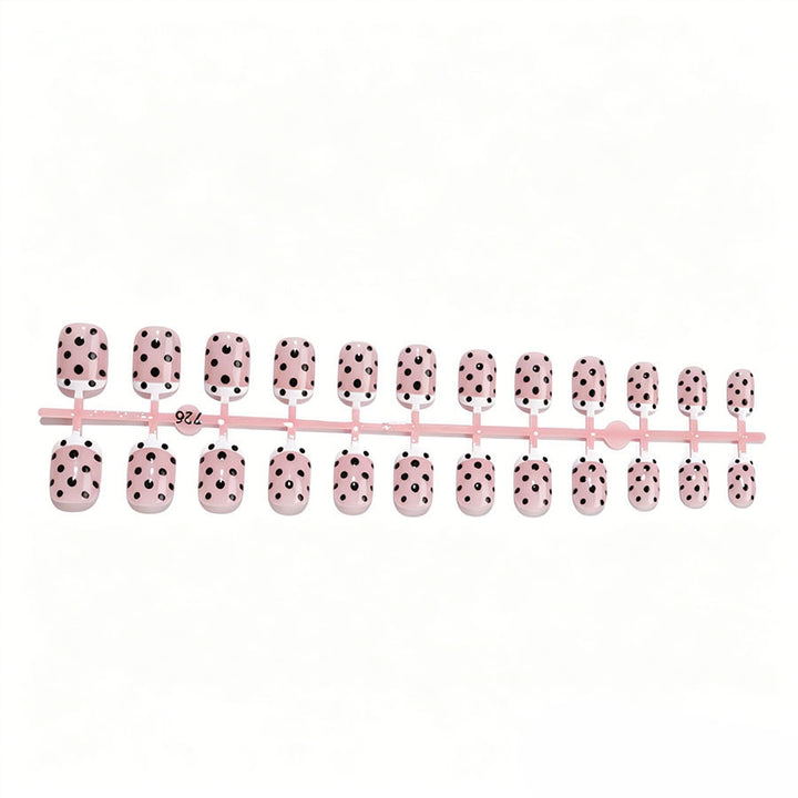 Artificial nail set with elegant dots and French tips Stornfield